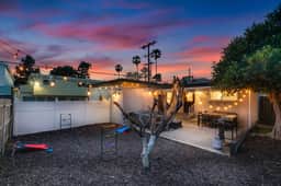 Beachside Retreat with Bikes and Firepit - Image 3