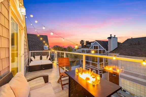 Beachside 3-Story Home with Patio and Rooftop Deck - Image 1