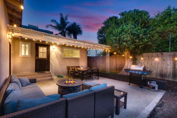 Beachside Retreat with Bikes and Firepit - Image 1