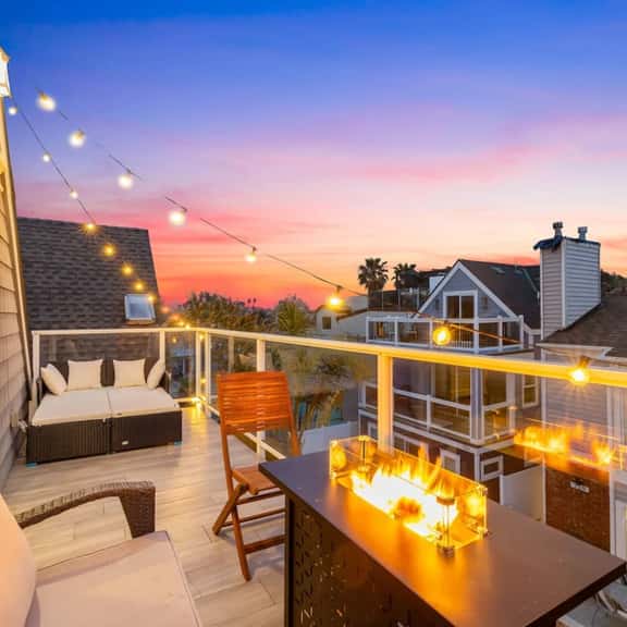 Beachside 3-Story Home with Patio and Rooftop Deck - Image 1
