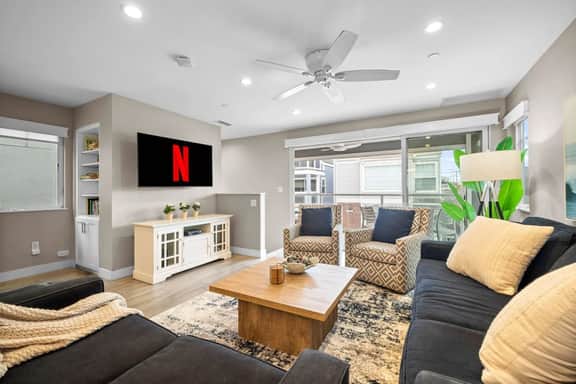 Beachside 3-Story Home with Patio and Rooftop Deck - Image 2